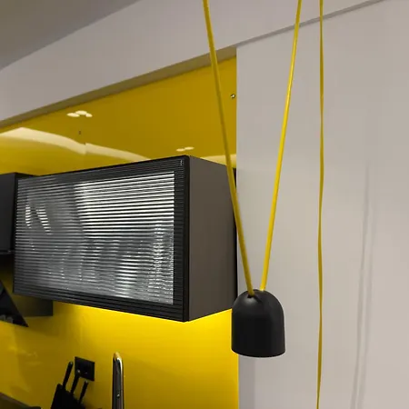 8 Black & Yellow Urban Center Apartment *
