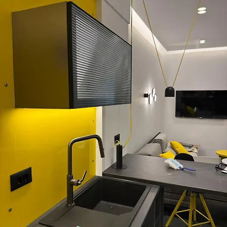 8 Black & Yellow Urban Center Apartment